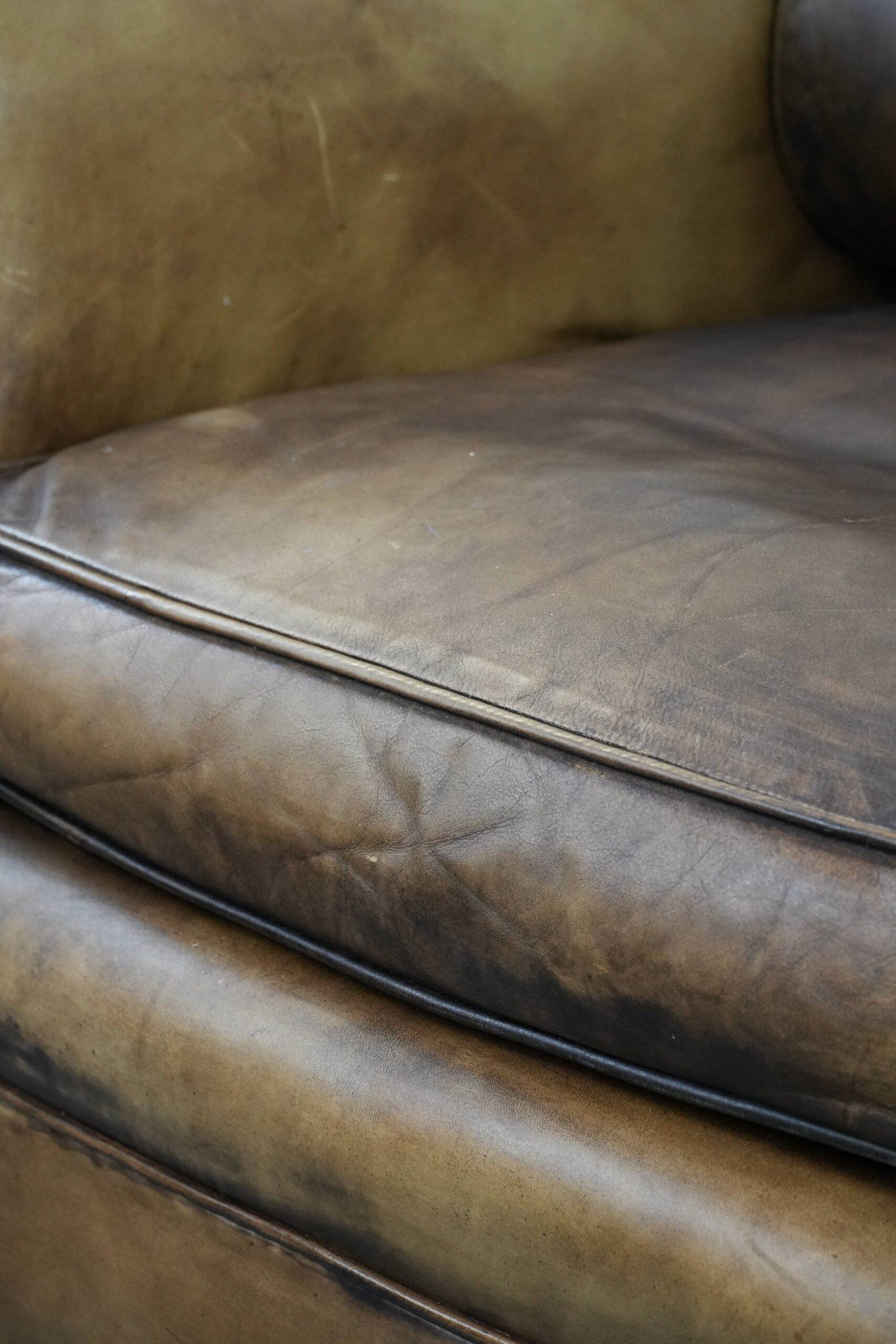 Luxury and large cowhide leather wingback chair in English style