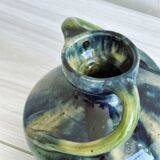 Two-handled ceramic vase with a blue and green gradient pattern.