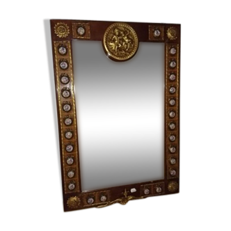 Mirror in gilded bronze and mahogany wood Medallion porcelain decoration.