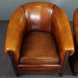 Set of 2 club chairs in black piping sheep leather