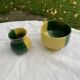 Enameled ceramic bowl and milk jug, two-tone yellow and green, vintage 1950