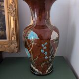 Large vintage antique vase with raised floral pattern.