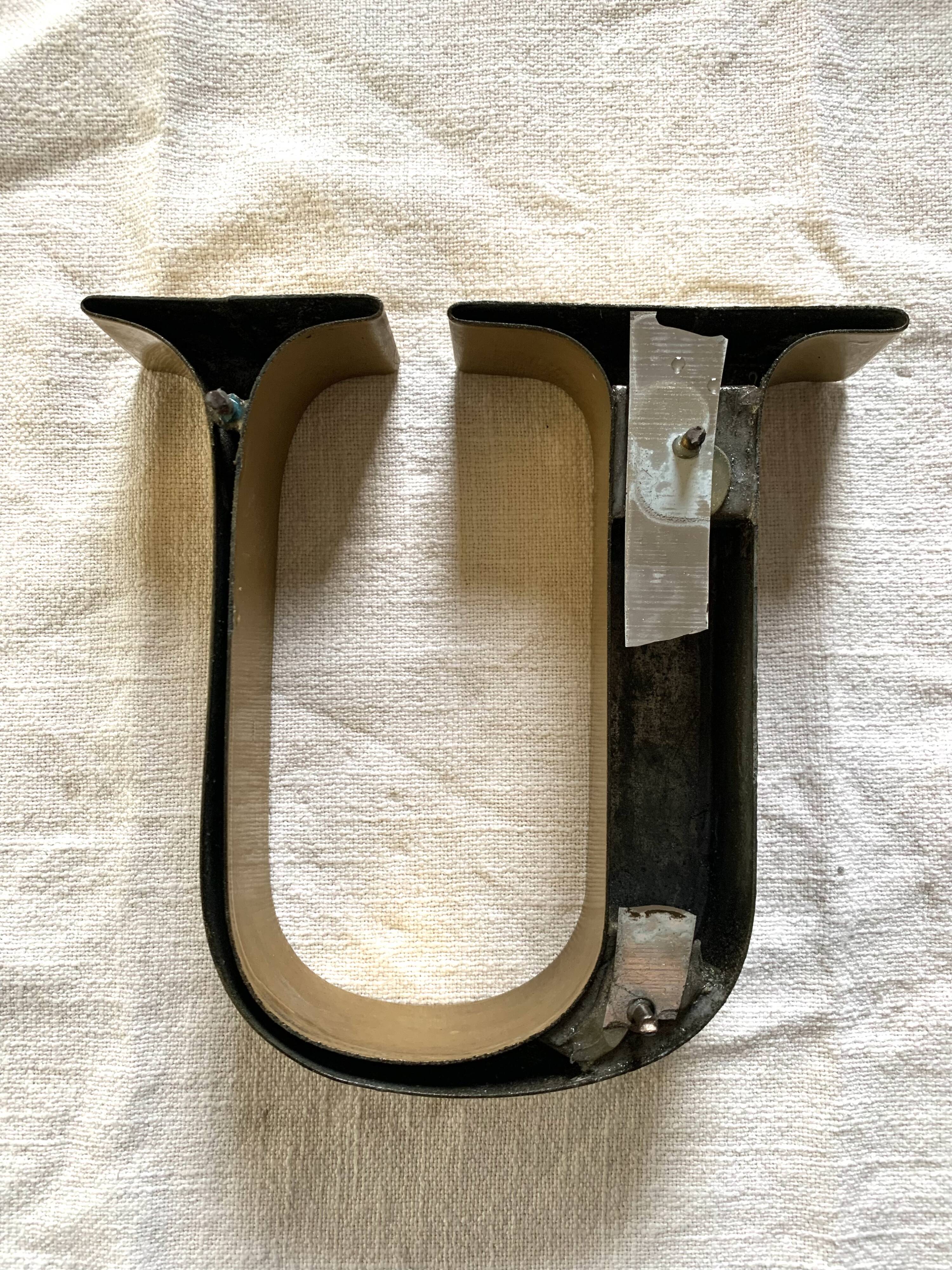 Vintage metal letter