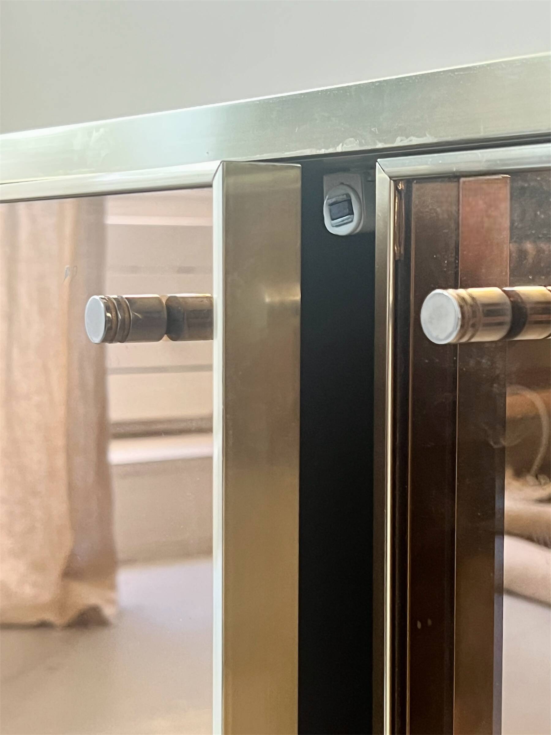 Low ivory lacquered enfilade, smoked mirror & brass JC Mahey, design 1970.