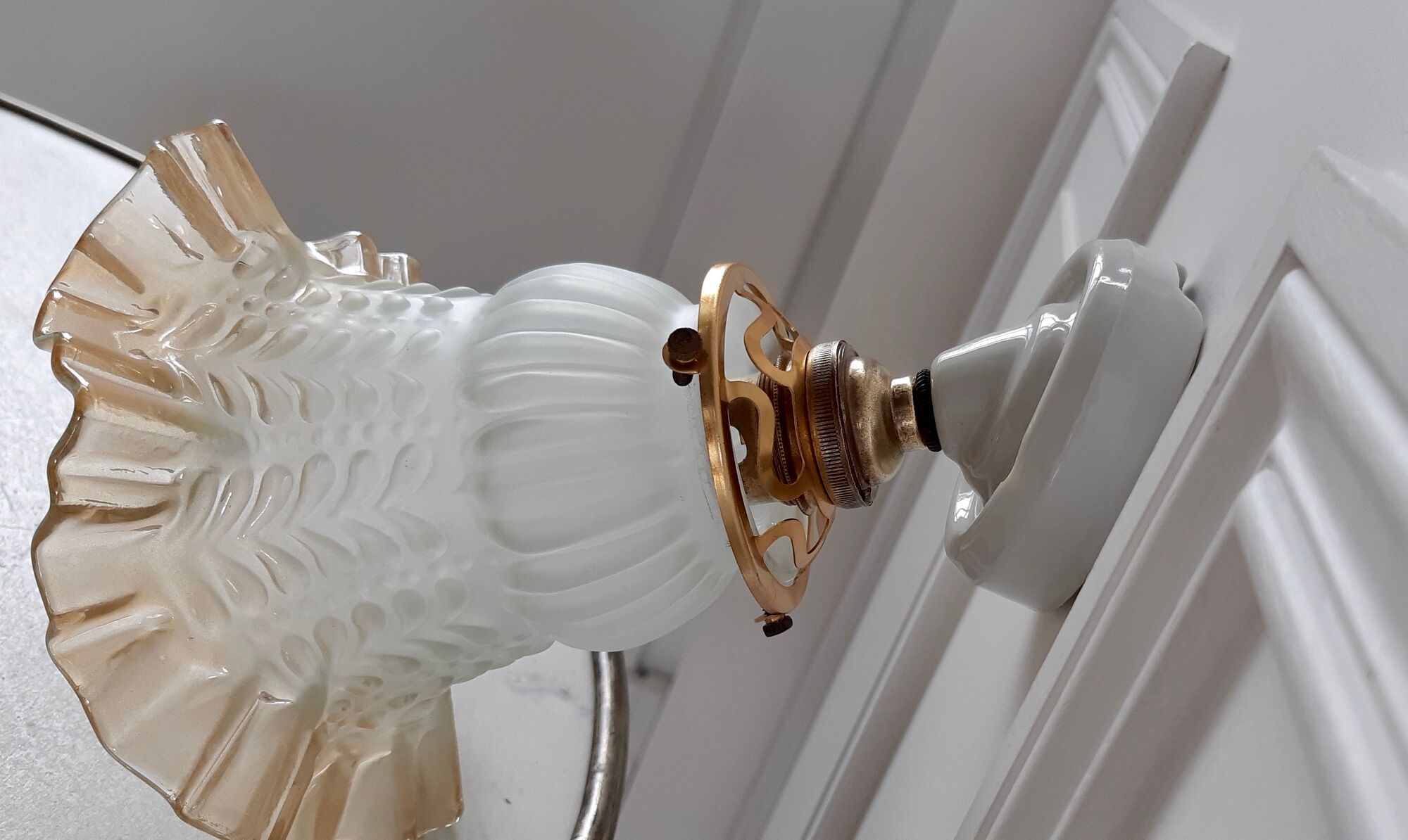 Glass tulip bathroom wall lamp and white porcelain base early XXth
