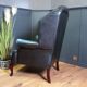 Blue chesterfield barrel back armchair
