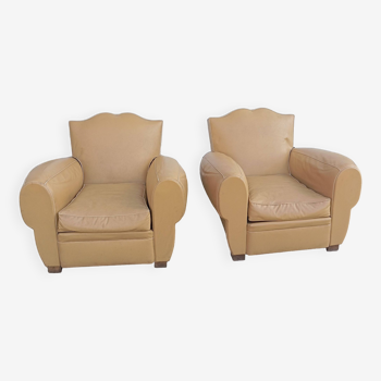 Pair of “mustache” club chairs