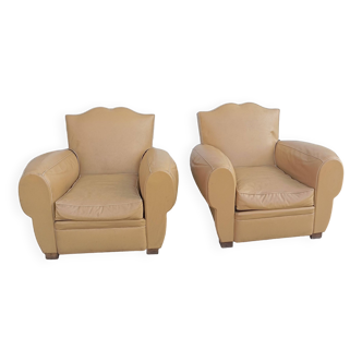 Pair of “mustache” club chairs