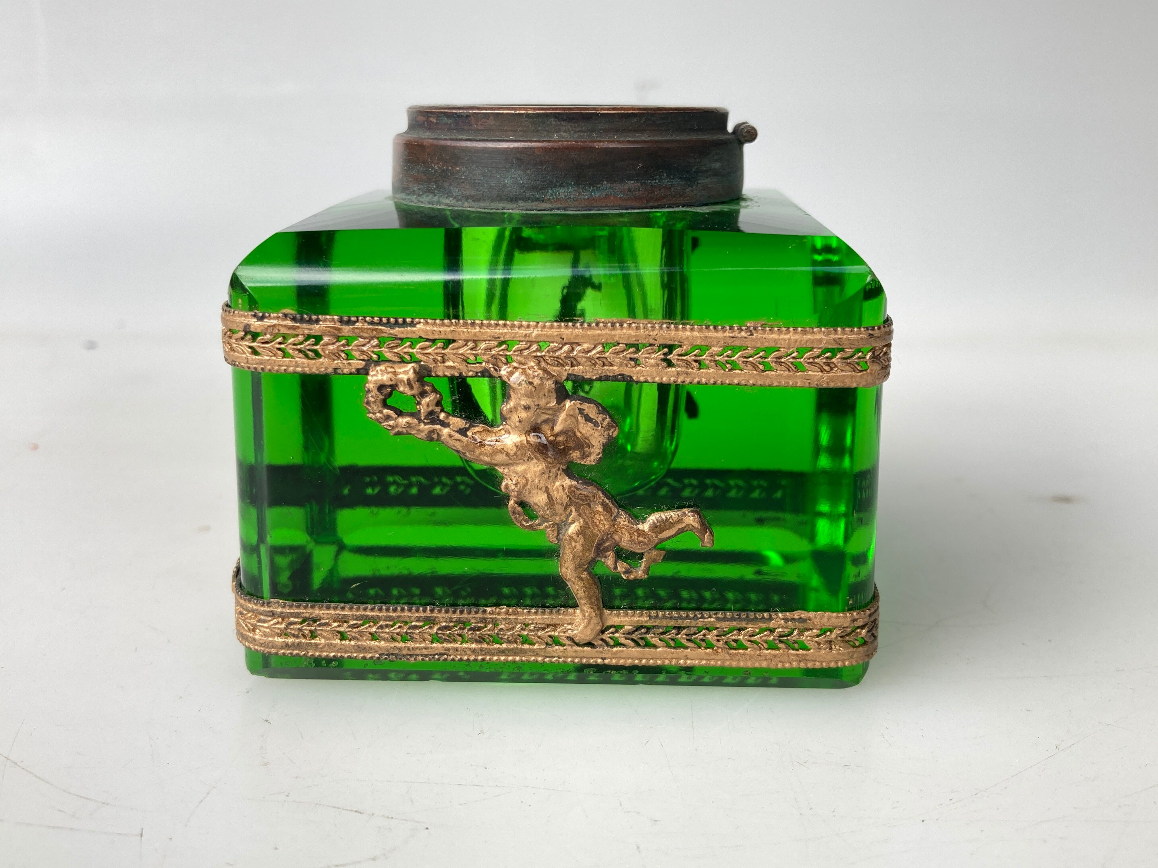 Glass inkwell decorated with golden angels