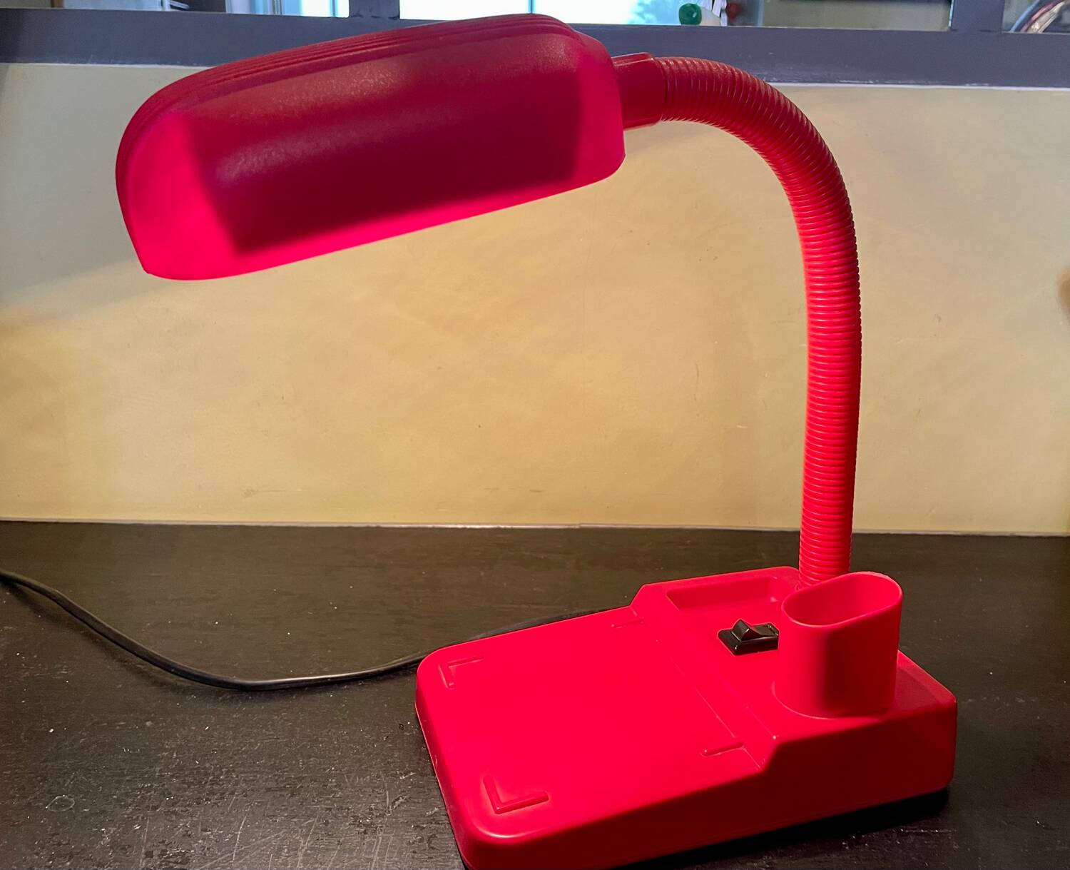 Vintage red articulated desk lamp