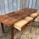 Antique chestnut farmhouse table with 3 drawers on the front.