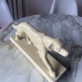 Ceramic of a walking dog brand Odyv