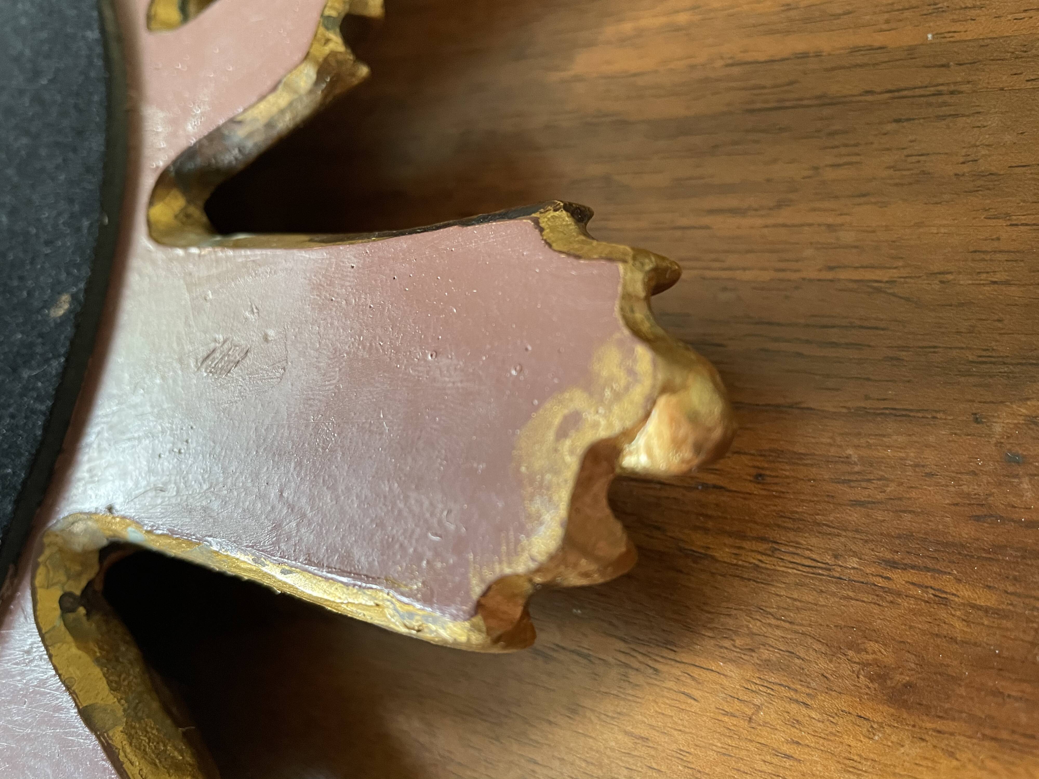 Vintage sun mirror in 60s/70s gold resin