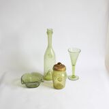 Biot bubble glass ensemble, bottle, jar, bowl and glass.
