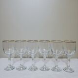 6 15cl stemmed glasses with gilding around the perimeter