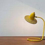 Perforated metal table lamp in Mid-Century Modern style, in the style of Mathieu Matégot, 1960s.