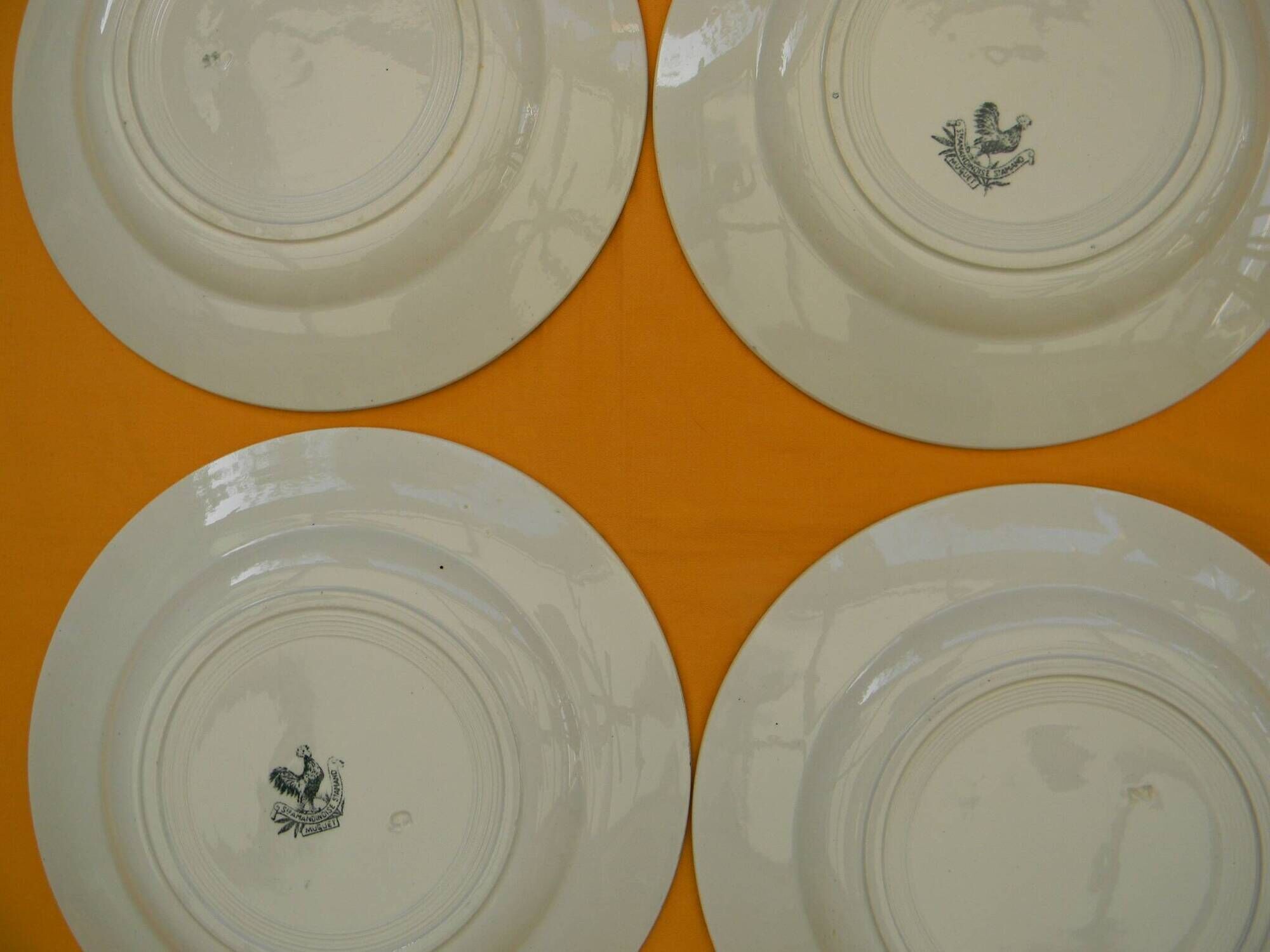 Set of 4 flat plates in saint amand earthenware. lily of the valley decor.
