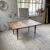 Walnut farmhouse table with swivel and extendable top