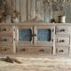Small piece of furniture with glass doors and drawers