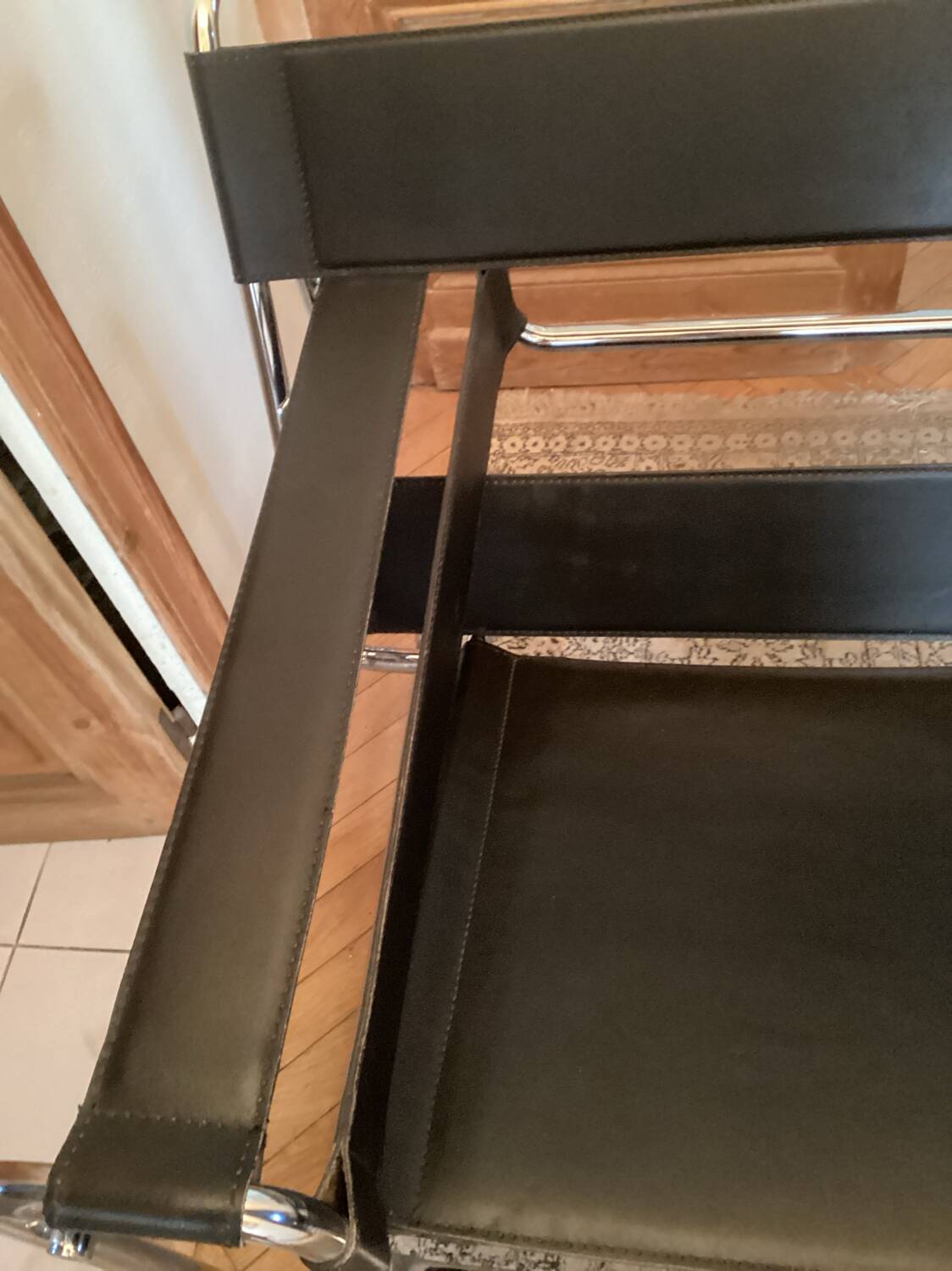 Pair of Wassily black leather armchairs