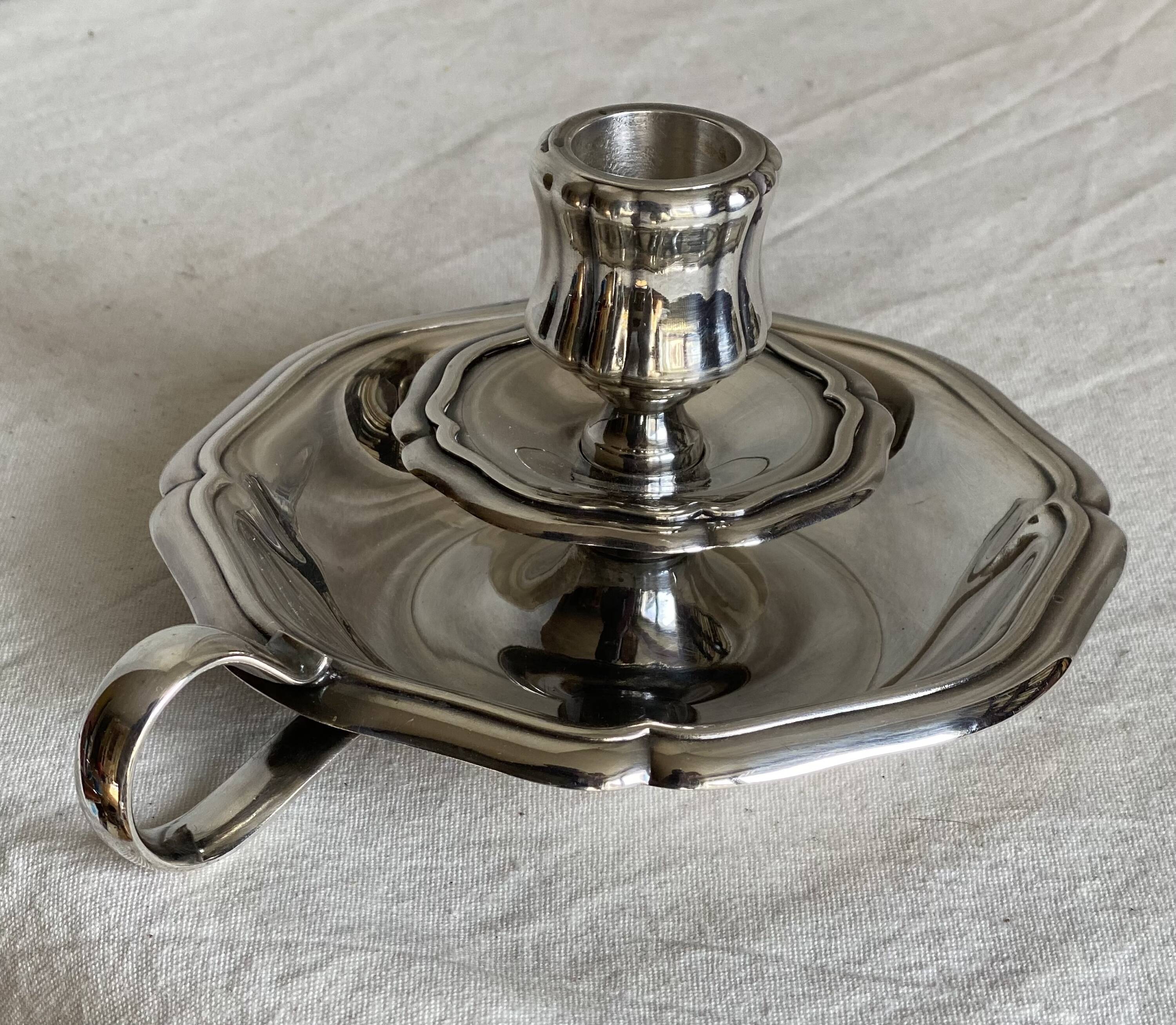 Silver-plated hand candlestick in the Louis XV style
