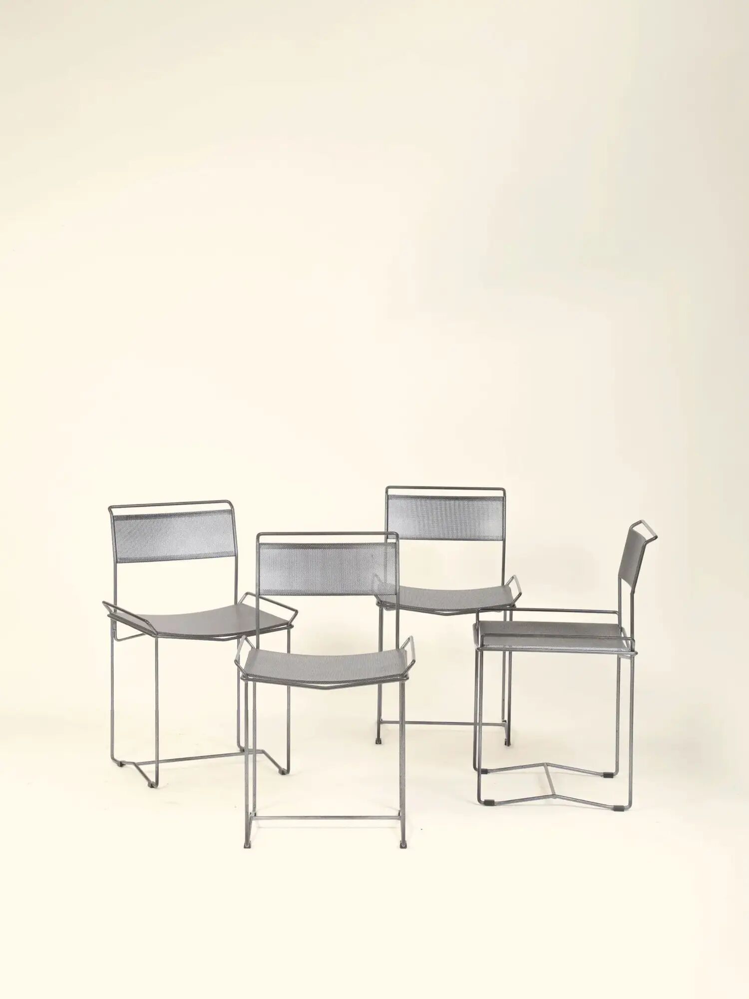 Perforated steel chairs