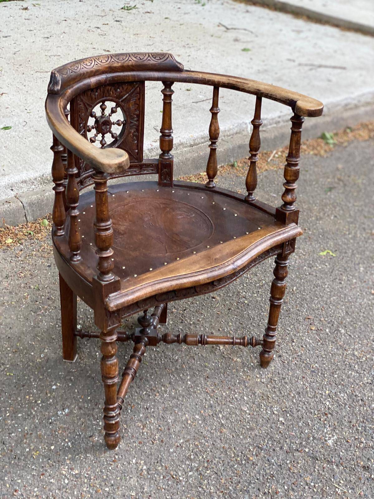 18th century Breton office chair in solid curved and carved wood