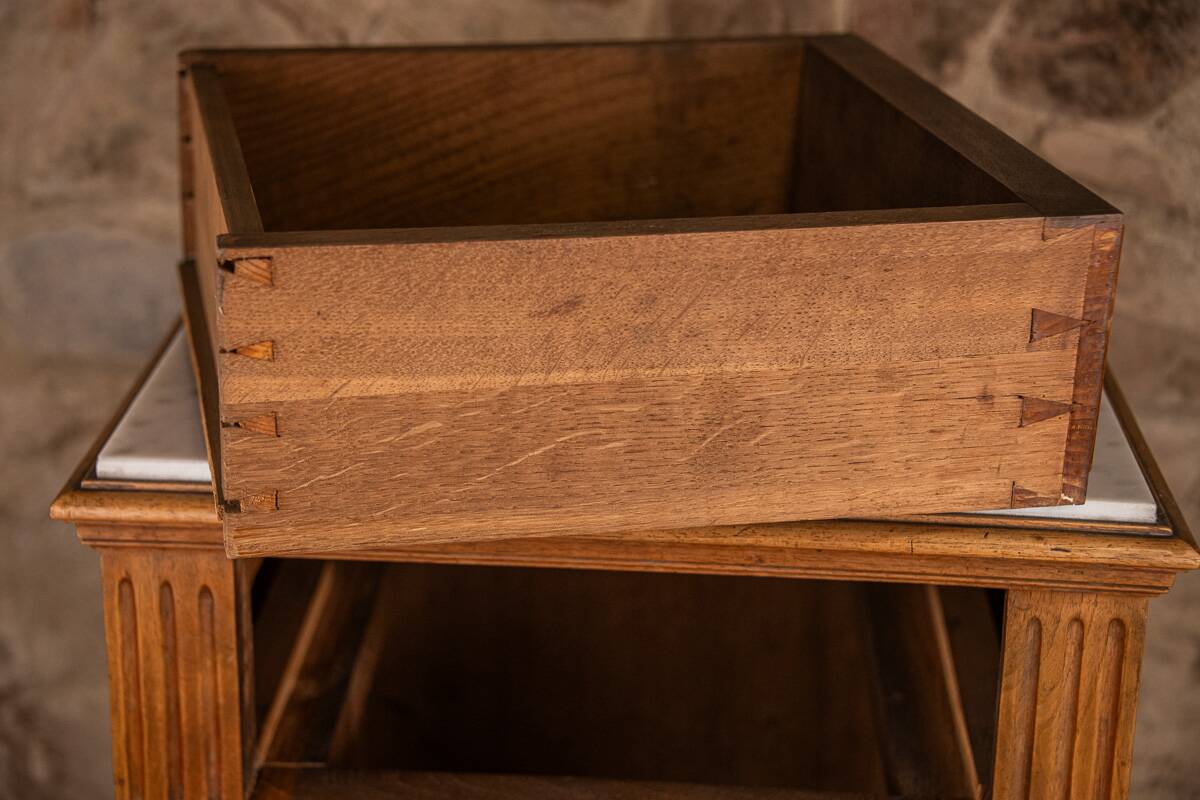 Louis XVI style bedside chest of drawers, marble top, late 19th century.