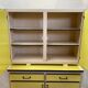 Yellow formica sideboard