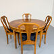 Round walnut Napoleon III extendable table with bronze top in good condition.