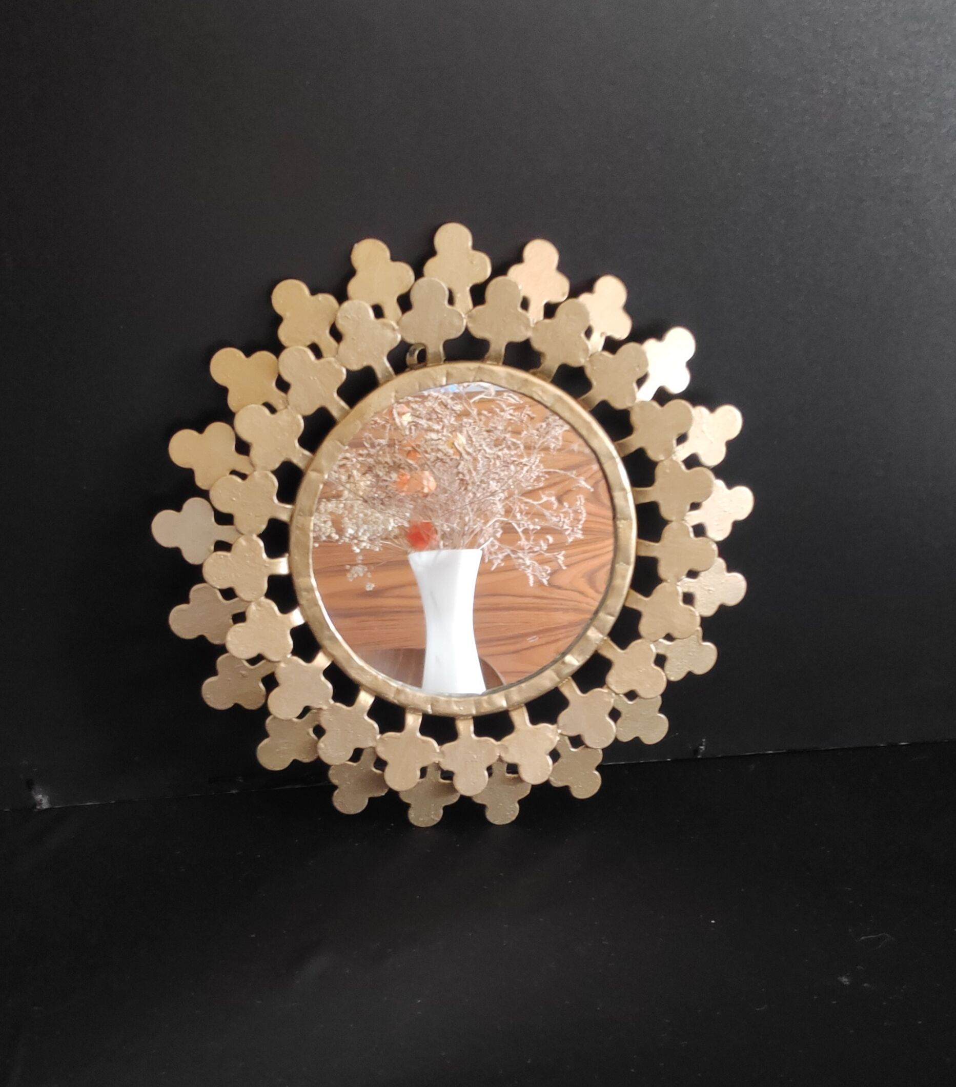 Miroir rond en métal doré