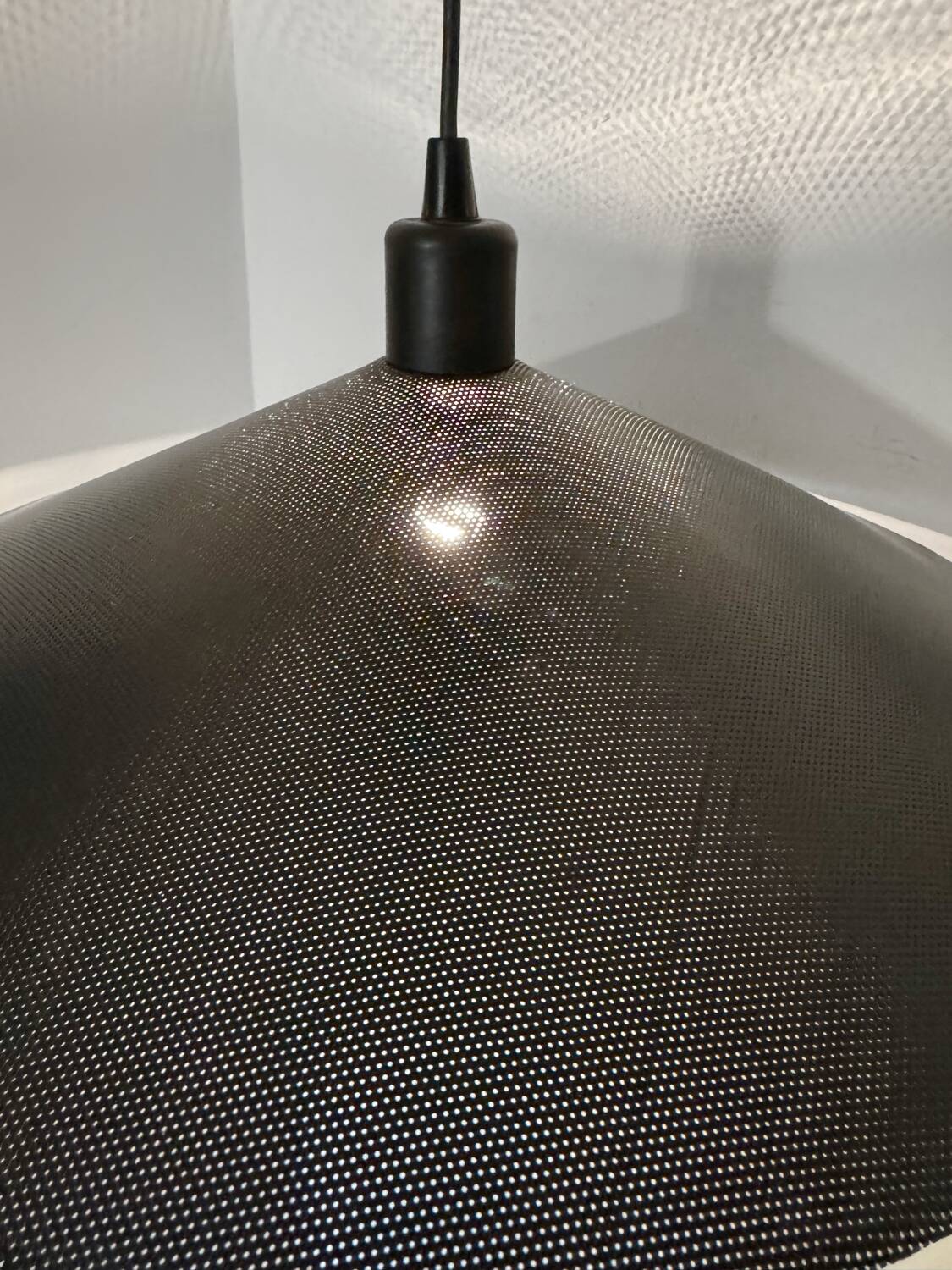 Metal micro-perforated suspension from the 1960s.