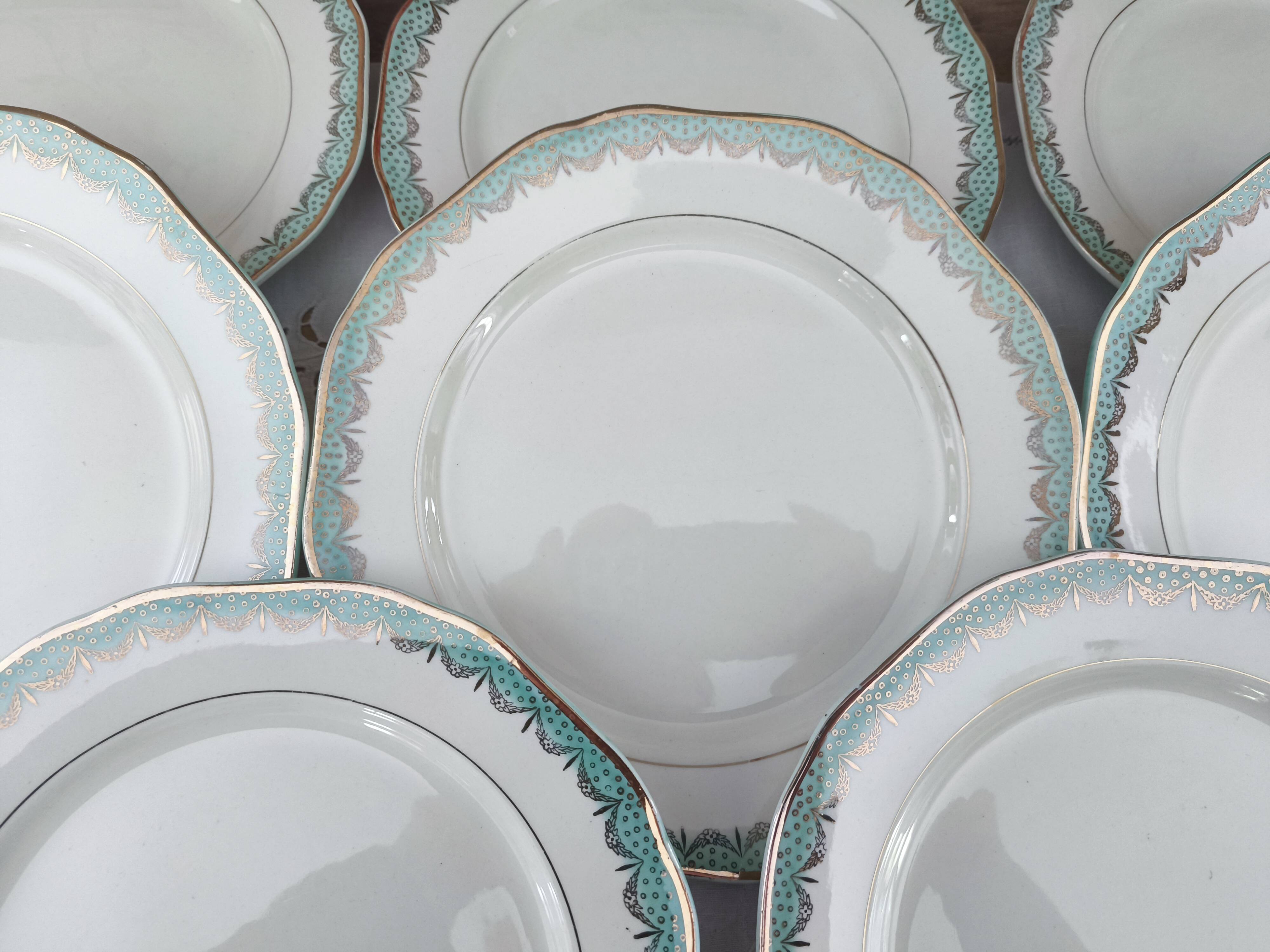 Set of 11 Longwy France earthenware dinner plates, Trianon model