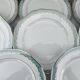 Set of 11 Longwy France earthenware dinner plates, Trianon model