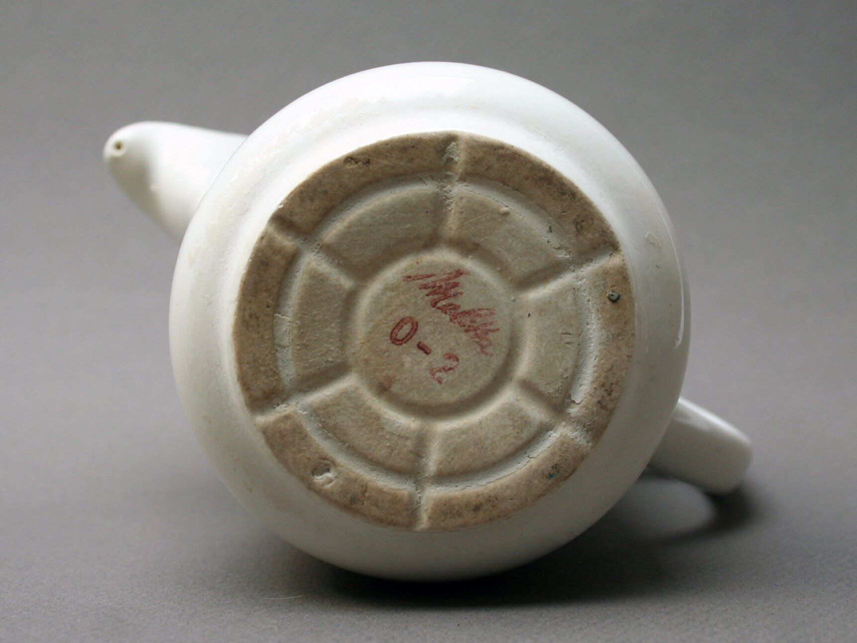 White ceramic coffeemaker and melitta filter, 60 years