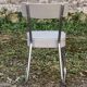 Set of 2 chairs and 1 armchair from the 70s in chrome metal and faux leather.