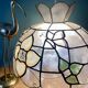 Vintage mother-of-pearl and brass lampshade pendant with flower and butterfly decorations