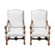 Paire de fauteuils en skaï blanc