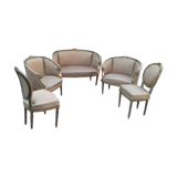 Golden lounge two armchairs and a gondola-shaped sofa and a pair of Louis XVI chairs