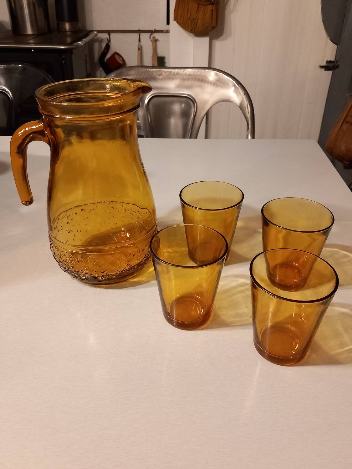 Italian pitcher service and 6 amber glasses