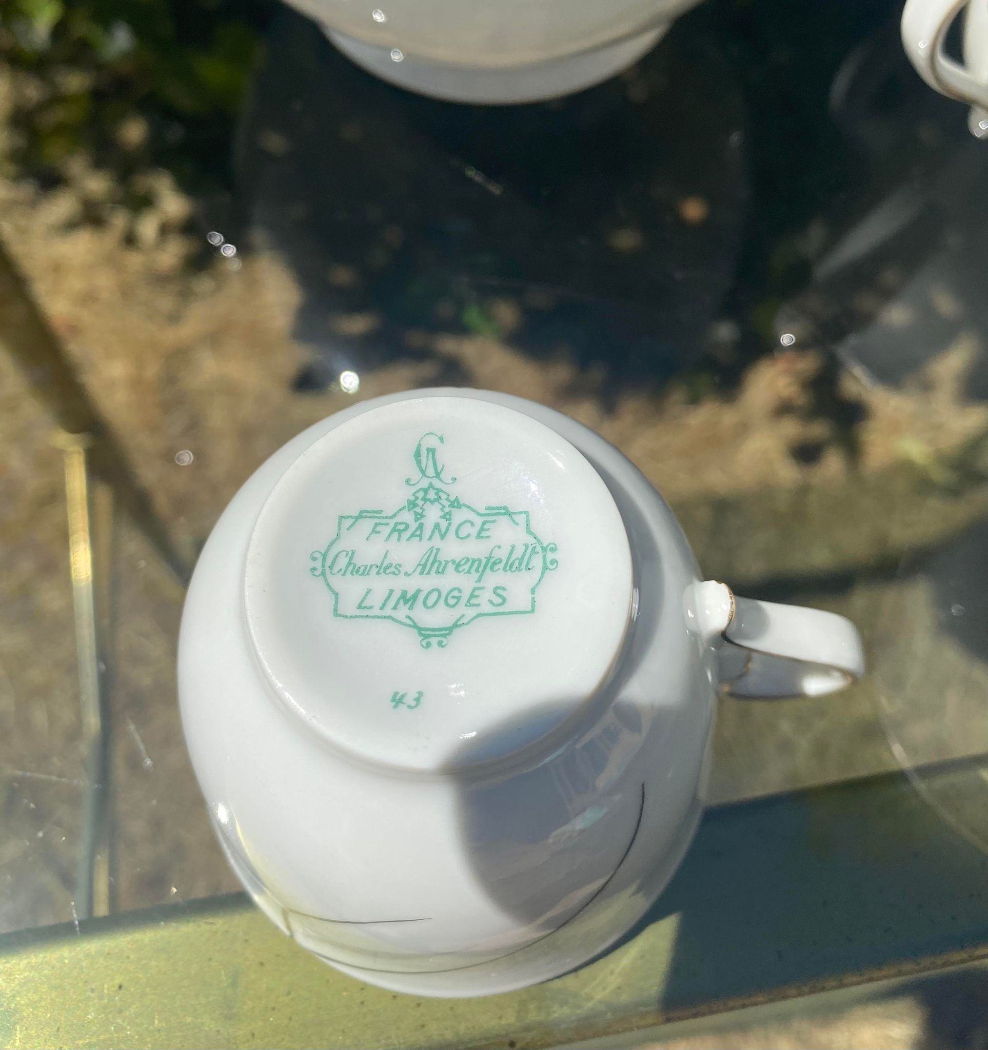 Porcelain coffee service by Charles Ahrenfeldt from Limoges France