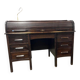 Vintage American wooden desk with a roll-top.