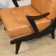 Paire de fauteuils vintage années 50 en bois noir et cuir caramel