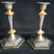 Pair of small English candlesticks in silver-plated metal and brass - 20th century.