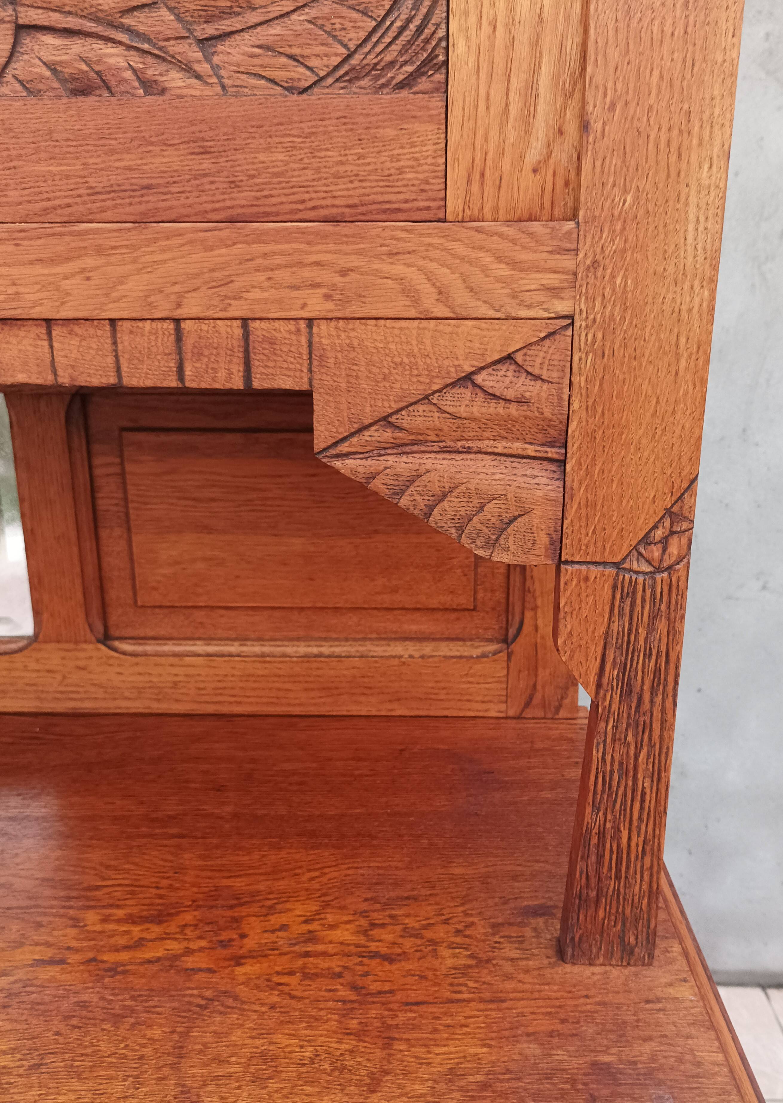 Art Deco period carved oak sideboard