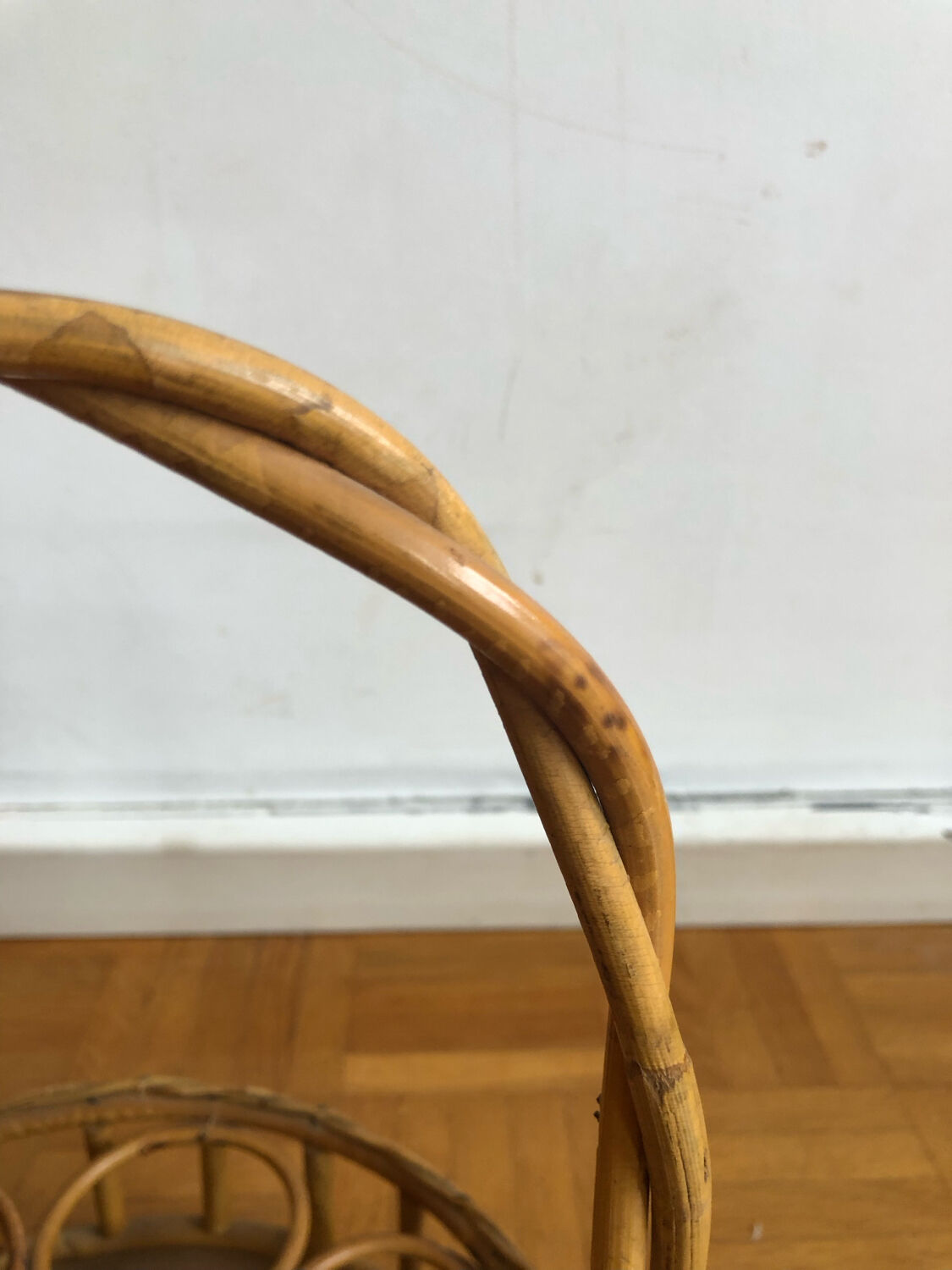 Vintage wicker bottle rack