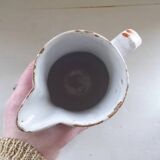 Old earthenware pitcher