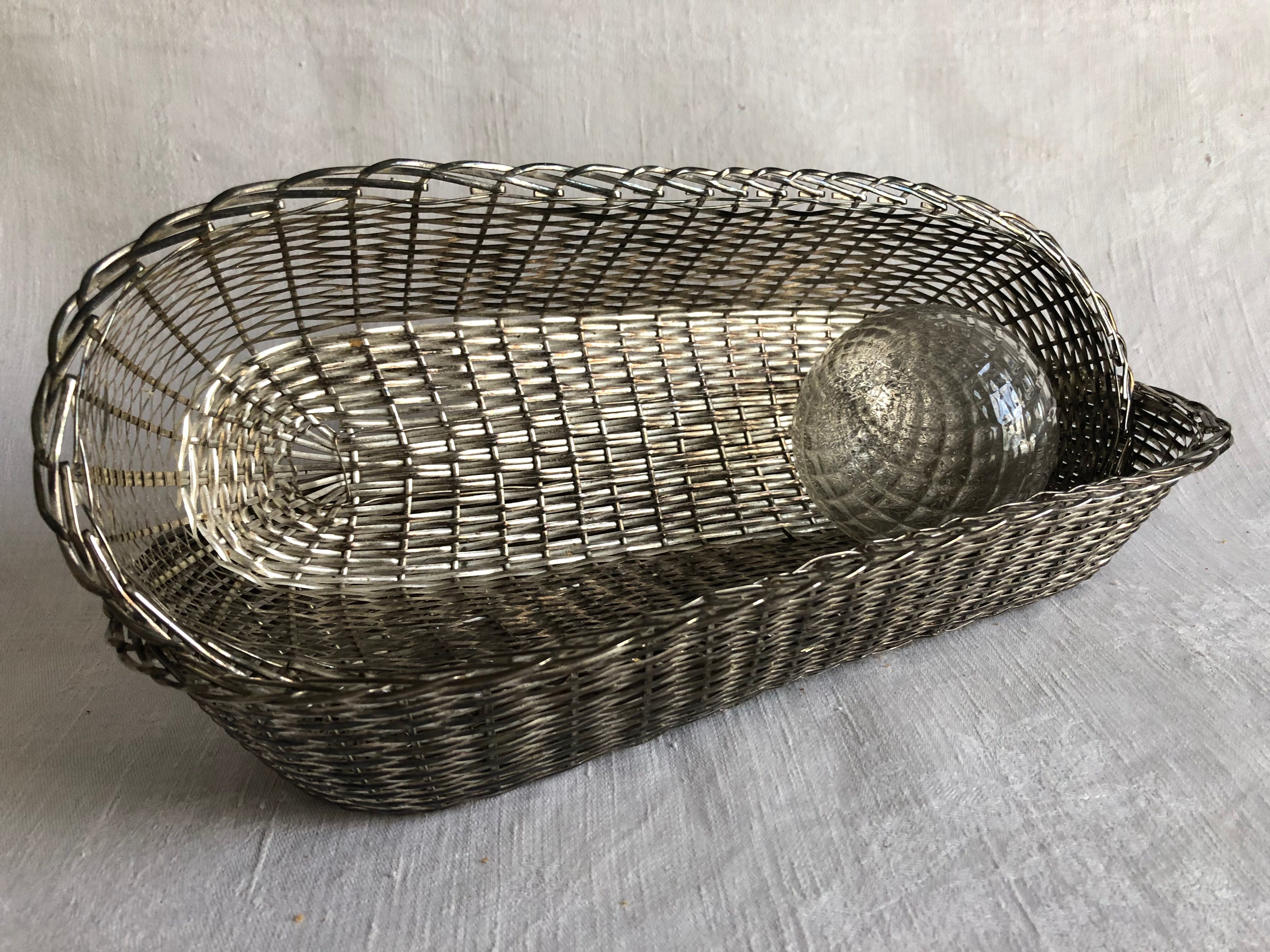 Braided silver metal bread basket