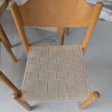Set of 6 stackable chairs in beech and jute.
