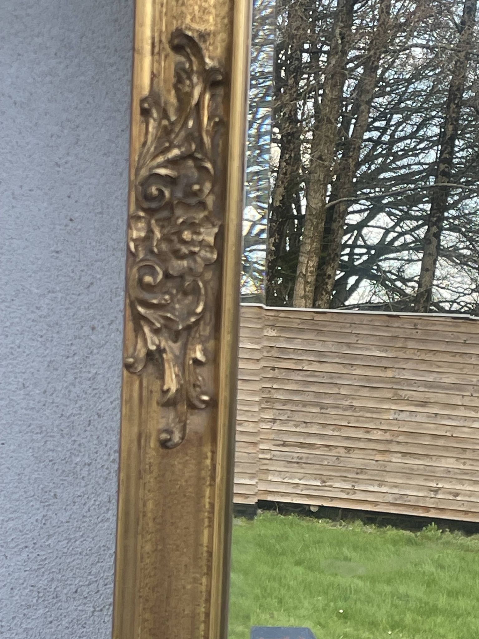 vintage bevelled mirror in rectangular shape, stucco and gilded wood in Louis XV baroque style